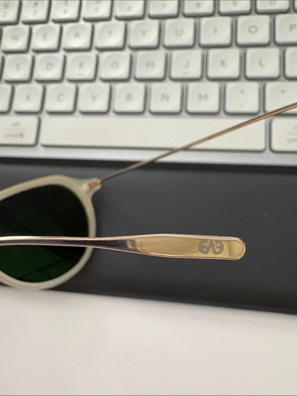 Eyevan Starburst ivory white sunglasses with custom grey lenses